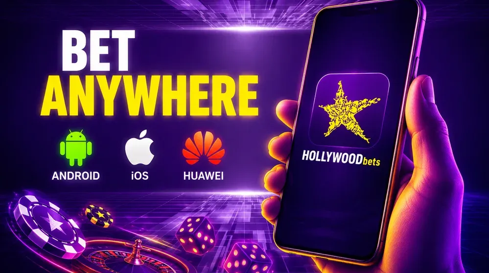 hand holding phone with Hollywoodbets app icon
